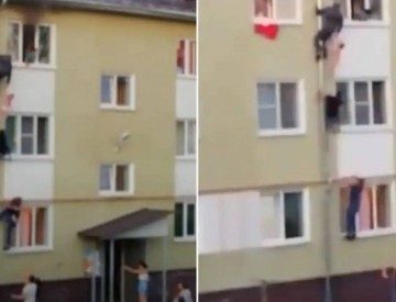 Homens escalam fachada de prédio para salvar três crianças de incêndio